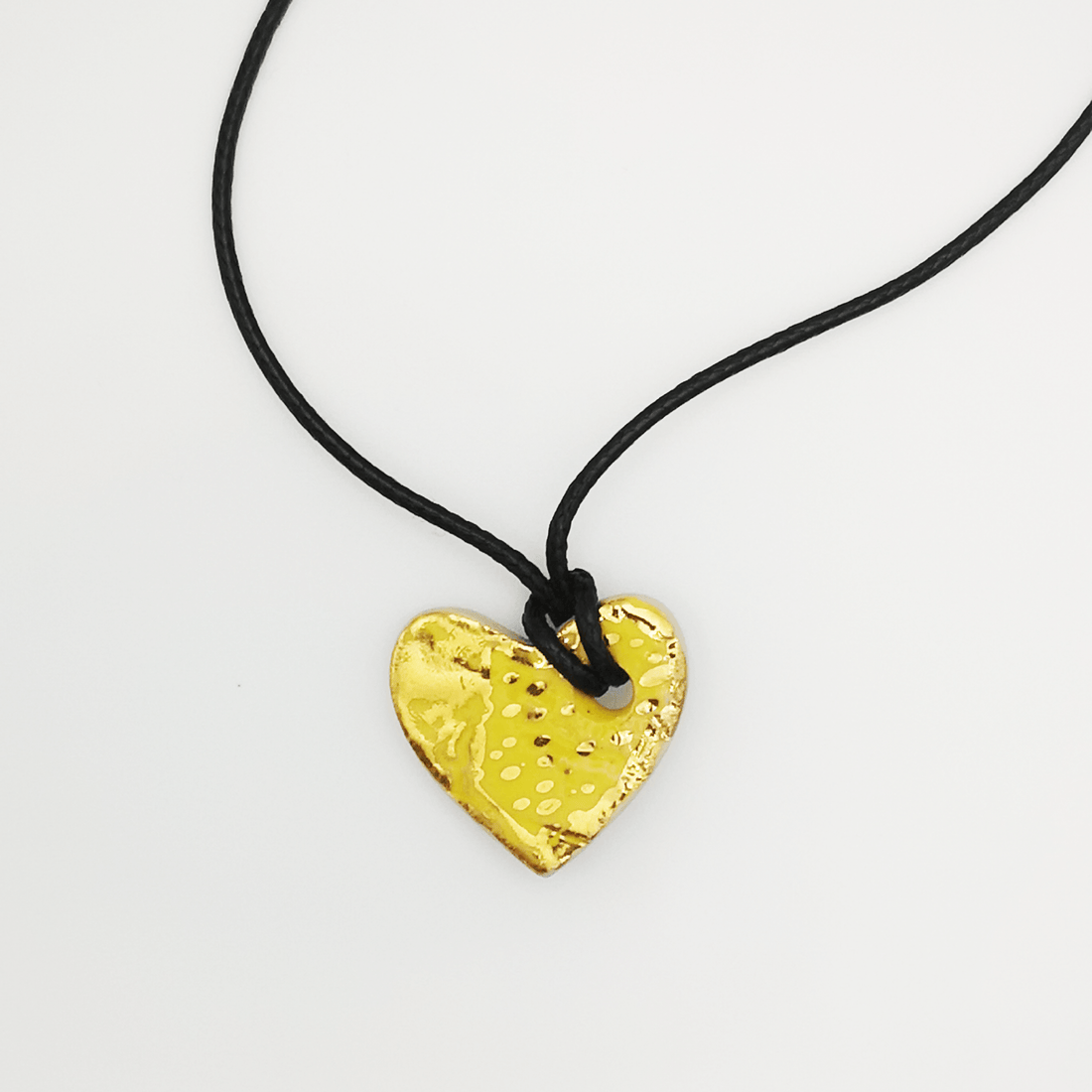 Collier coeur jaune cordon cuir