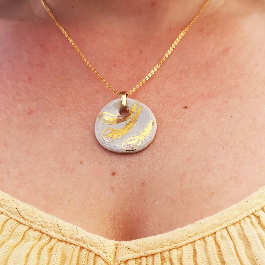 Collier effet nacre or tigre