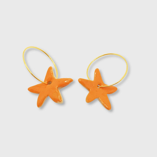 Boucles d'oreilles orange légères étoile
